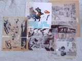 a lot of comic books on the table