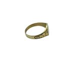 a close up of a gold ring on a white background