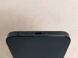 the back of a black iphone with the camera facing towards the camera