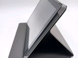 a tablet that is sitting on top of a stand