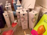 many different types of cosmetics products on the table