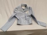 the jacket is blue and white with white buttons on it