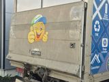 a truck that is parked in front of a building