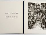 an open book with a black and white drawing of a street