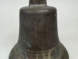 a small bell that is sitting on a table