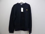 a close up of a black sweatshirt hanging on a hanger