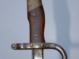 a close up of a knife on a table