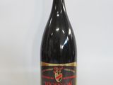a bottle of wine that is sitting on a table