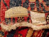 a close up of a piece of fabric with a tag on it
