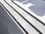 several pieces of metal sit on top of each other on a table