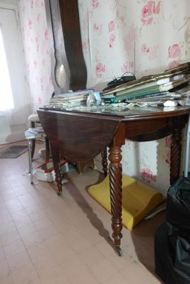 a table with a mirror on top of it in a room