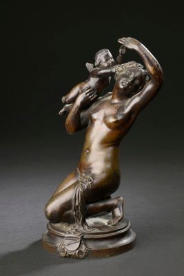 an image of a bronze statue of a woman with a bird on her shoulder