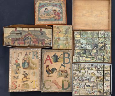 plusieurs cartons de livres pour enfants posés sur une table