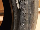 a close up of a tire on a wooden floor