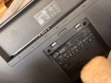 a close up of a laptop that has a battery in it