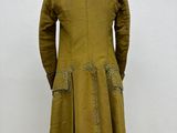 the back of a green coat on a mannequin mannequin mannequin mannequin mannequin mannequin mannequin mannequin