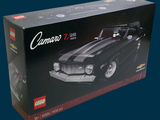 a black box with a black and white car inside of it