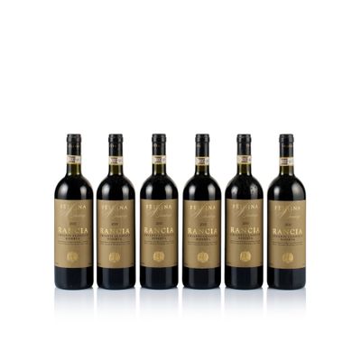 four bottles of red wine in a row on a white background