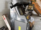 a machine that is sitting next to a stair case