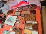 a bed with a lot of stuff on it