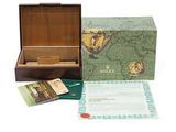 a wooden box with a map on it and a card in it