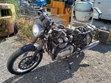 a motorcycle that is sitting in the dirt