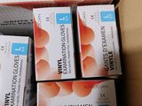several boxes of vitamins are stacked on top of each other