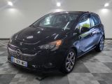 a picture of a small black car parked in a garage