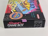 the box for the game boy is sitting on a white surface