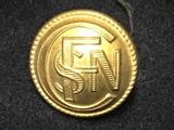an image of a gold coin with the letter n on it