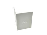 a white box with the word omega on it