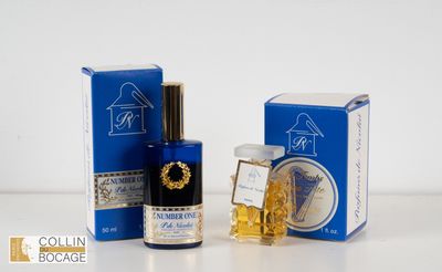 une image représentant un flacon d'eau de Cologne à côté d'une boîte d'eau de Cologne