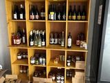 many bottles of wine on the shelves in the room