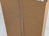 a cardboard box that is sitting on the floor