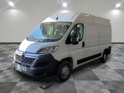 a picture of a white van parked in a room