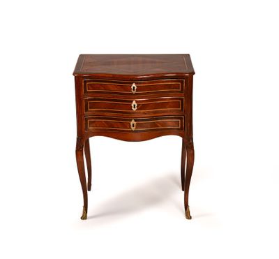 an image of a small chest of drawers on a white background