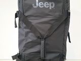 the back of a grey backpack with the jeep logo on it
