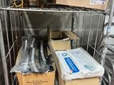 many boxes of toilet paper and other items on the shelves