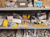 a shelf full of assorted items in a room