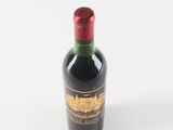 a bottle of wine that is sitting on a table
