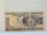 une photo d'un billet de banque sur lequel figure le portrait d'un homme