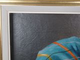 portrait of a woman in a blue dress with a striped blanket
