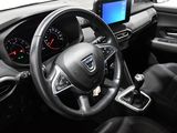 the interior of a car with a steering wheel, dashboard, and dash board