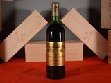 a bottle of wine that is sitting on a table