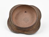 brown ceramic incense holder on white background with white background