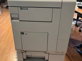 a printer that is sitting on top of a desk