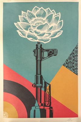 an image of a poster with a flower on top of a gun