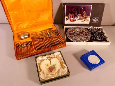a box of silverware and a box of silverware on a table
