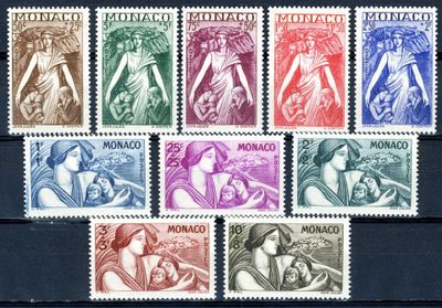 a close up of a group of stamps on a wooden surface