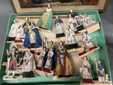 a lot of figurines in a box on a table